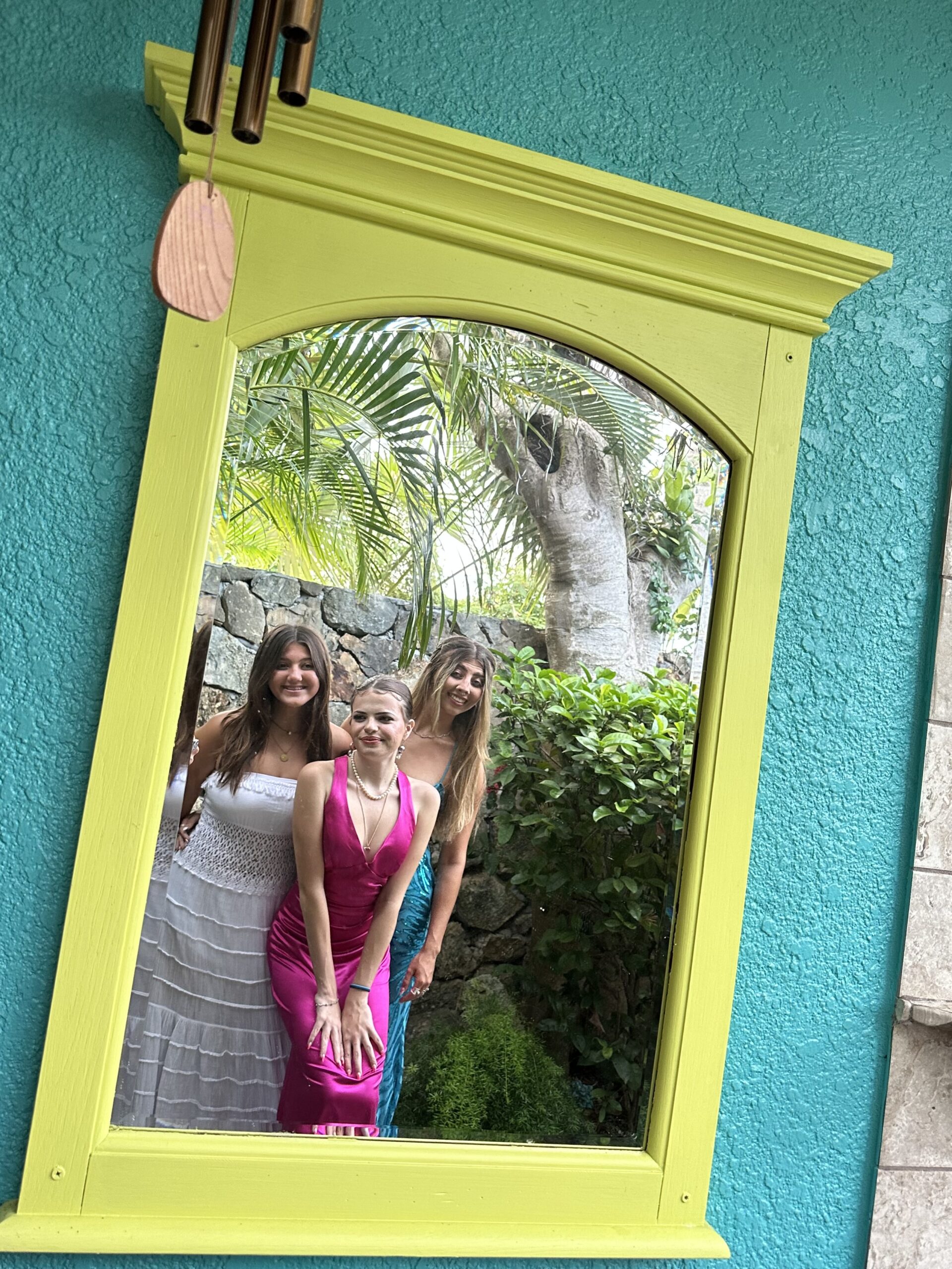 3 Prom goers looking into the mirror-Secret Garden