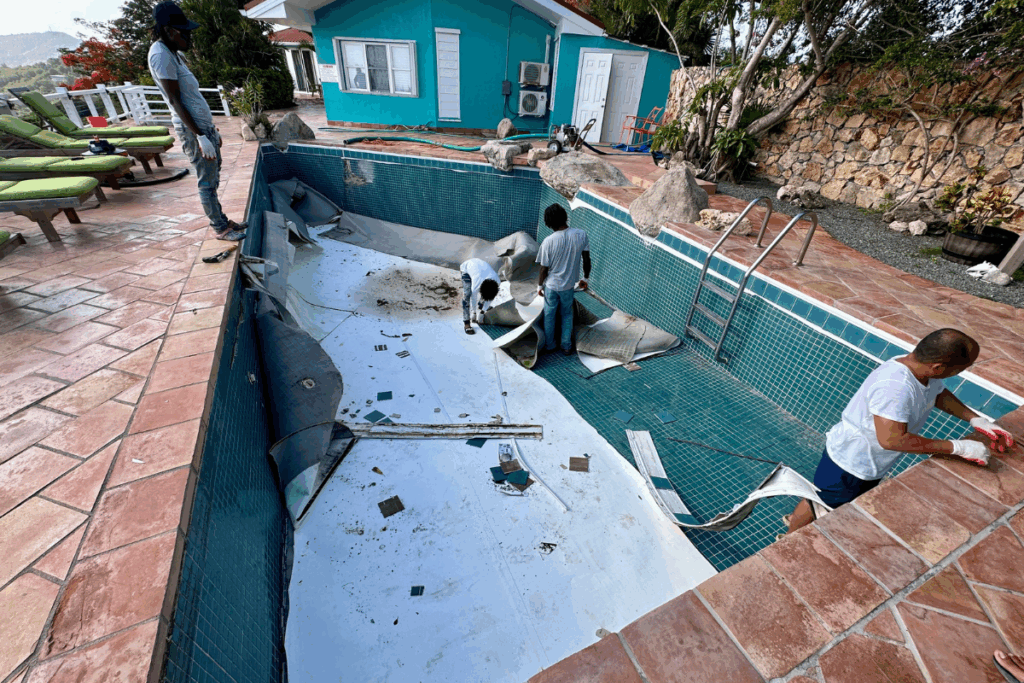 Liner in old pool being removed